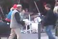 Volarius playin drums with his band