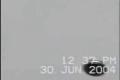 Osem krát nafilmovaný neidentifikovaný lietajúci objekt UFO nad mestom Miláno v Taliansku. Film číslo 2/8: 30. jún 2004.